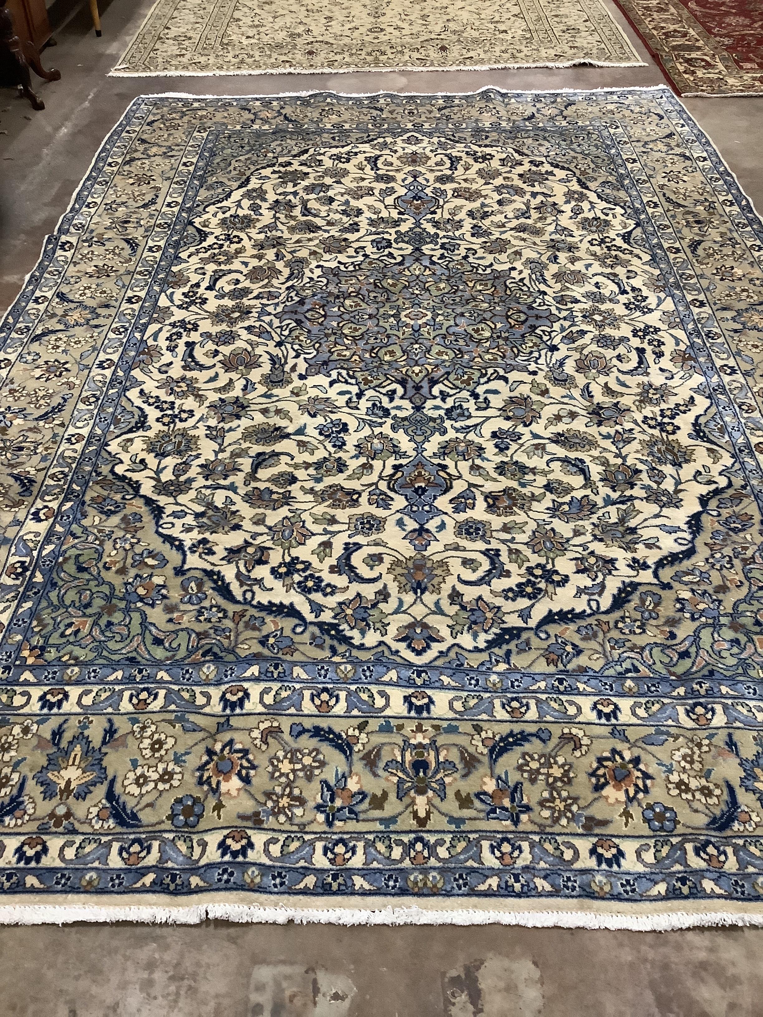 A Najaf Abad ivory ground carpet, 340 x 240cm